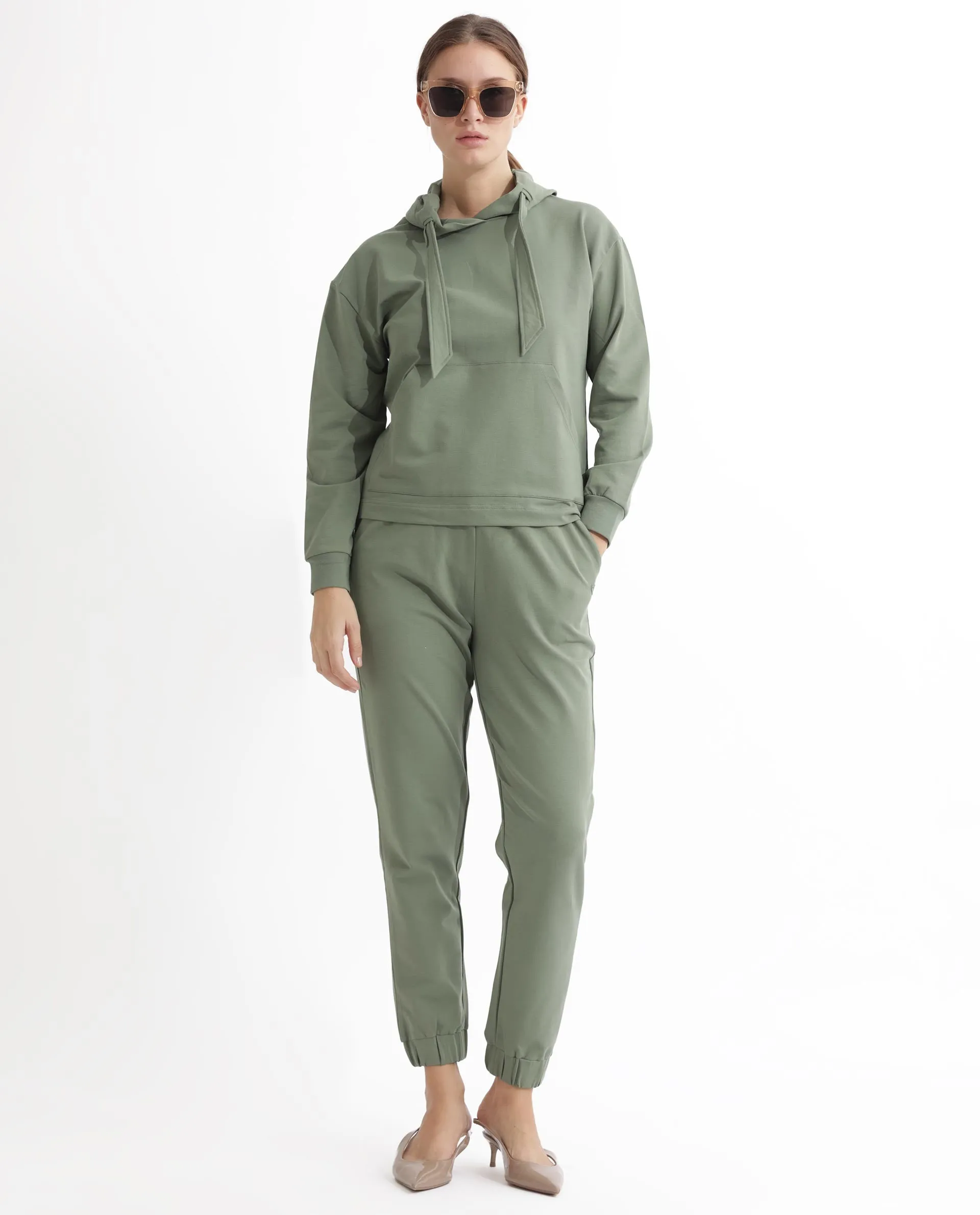 Rareism Women Terac Dusky Green Cotton Lycra Fabric Regular Fit Solid Mid Rise Ankle Length Track Pant
