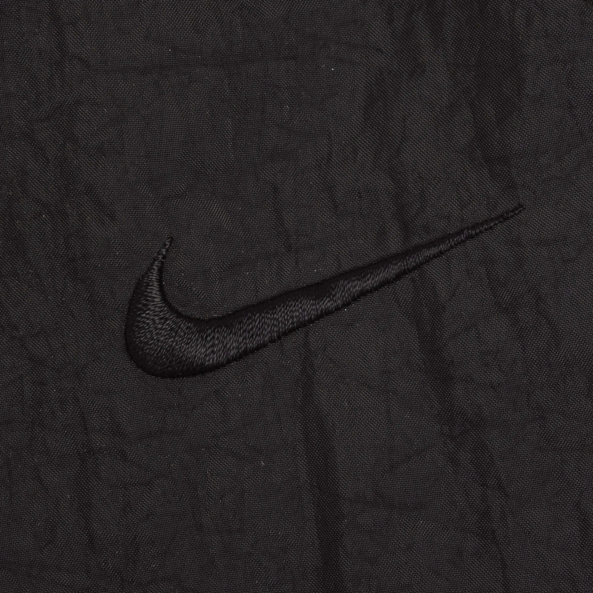 VINTAGE NIKE CLASSIC SWOOSH BLACK NYLON TRACK PANTS 1990S SIZE XL DEADSTOCK